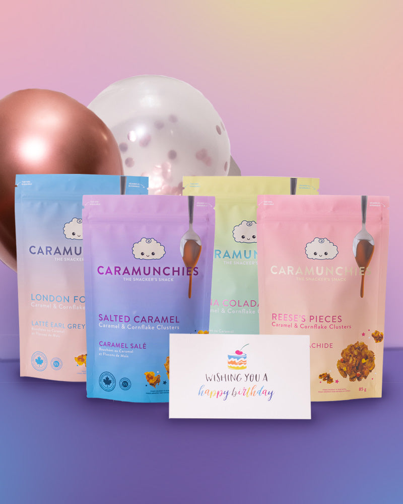 Four Caramunchies pouches with two balloons and a birthday card. Perfect for gifts for foodies.